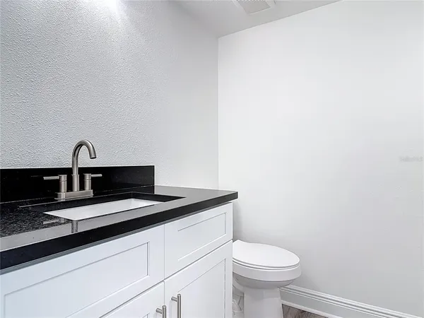 a bathroom with a sink and a toilet