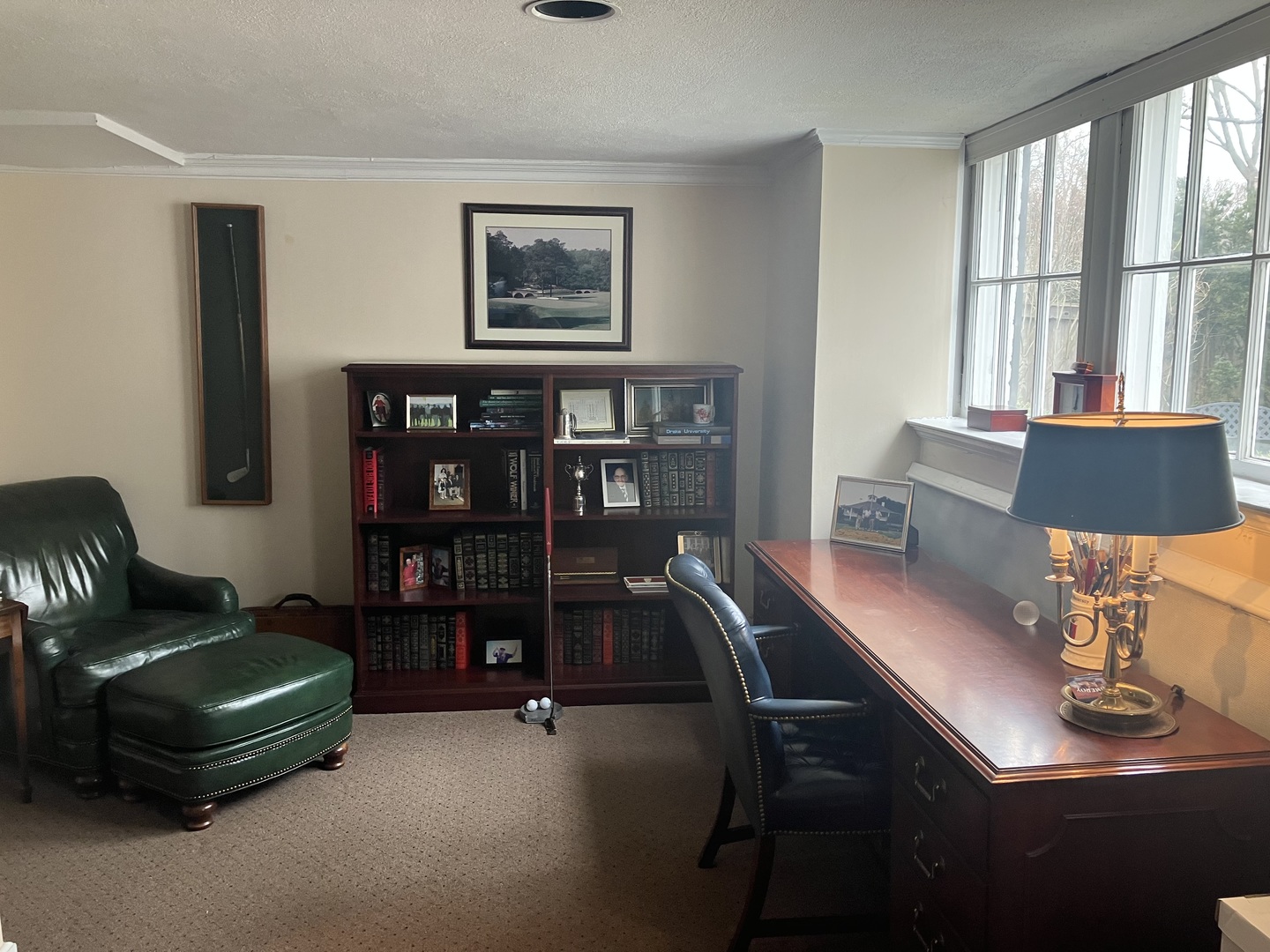 111 Church Road Winnetka, IL 60093 - Photo 8 of 12 a living room with furniture and a bookshelf