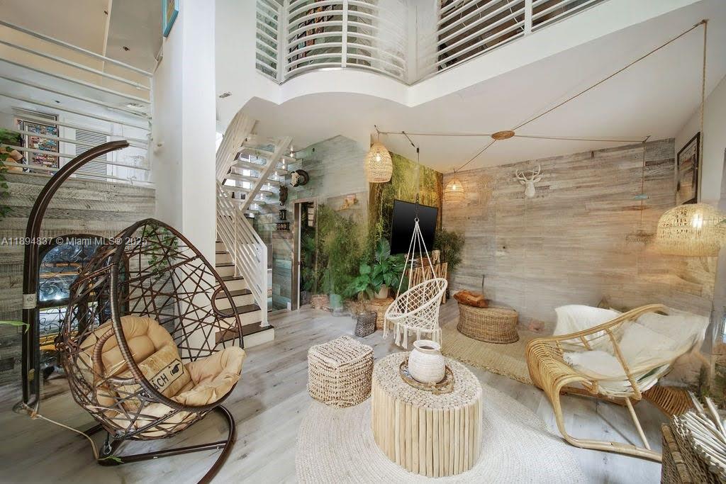 a view of a porch with dining area