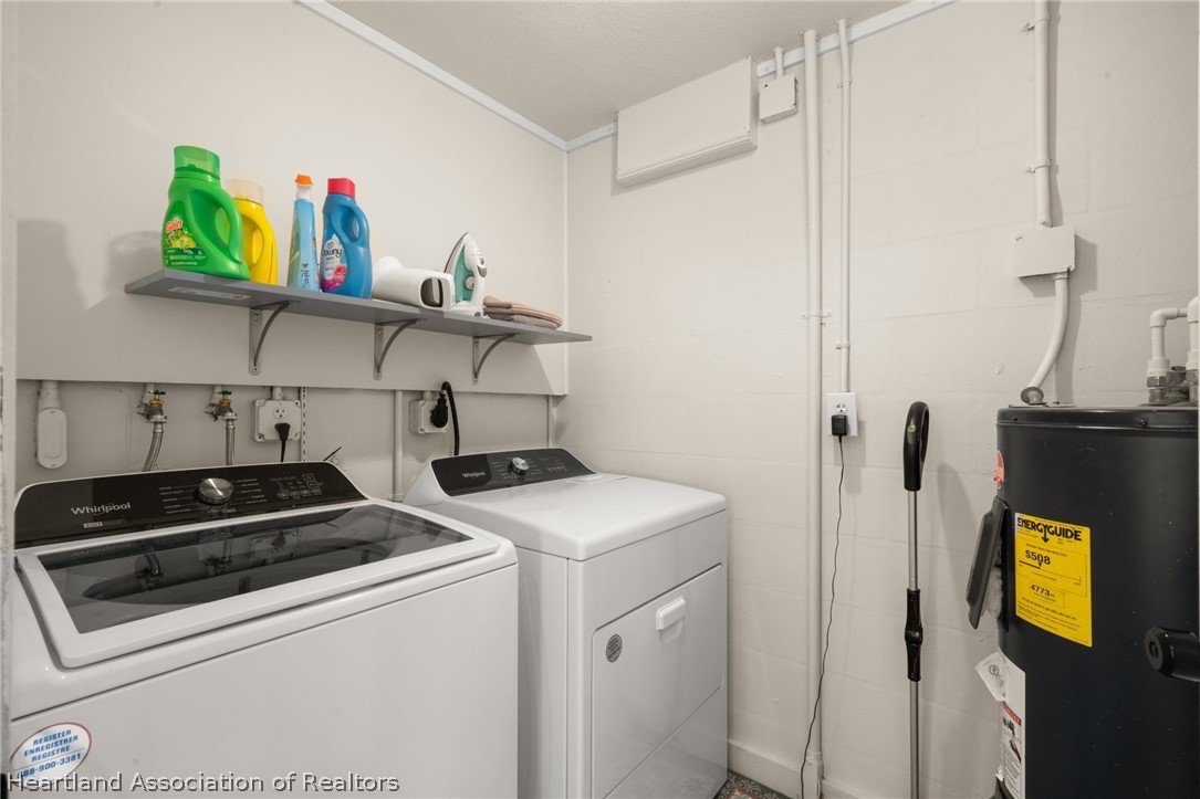 1843 South Lake Reedy Boulevard Frostproof, FL 33843 - Photo 18 of 50 a utility room with dryer and washer