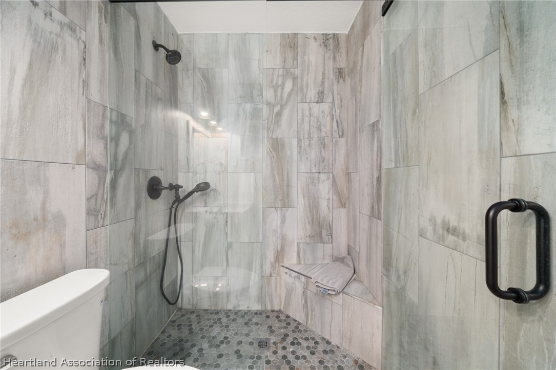 1843 South Lake Reedy Boulevard Frostproof, FL 33843 - Photo 33 of 50 a bathroom with a shower