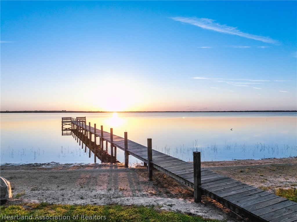 1843 South Lake Reedy Boulevard Frostproof, FL 33843 - Photo 4 of 50 a view of ocean with a bench
