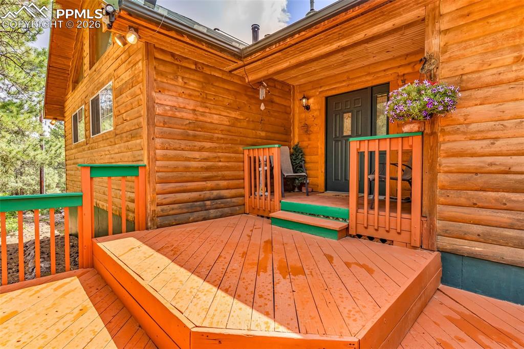 209 Rosewood Road Westcliffe, CO 81252 - Photo 7 of 49 Great front deck for enjoying the cool nights and afternoon shade