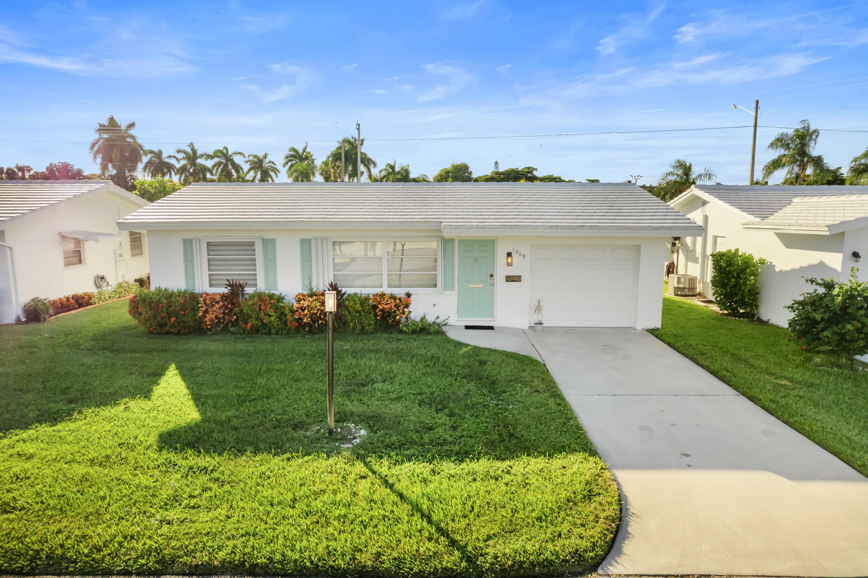 1308 Southwest 24th Street Boynton Beach, FL 33426 - Photo 19 of 19 a view of a house with a backyard