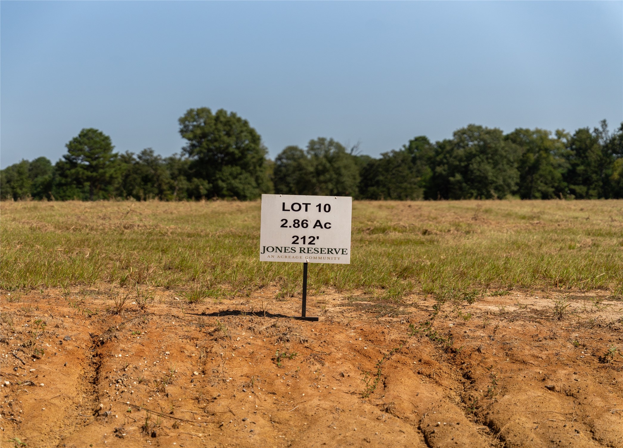 a sign board with ocean view