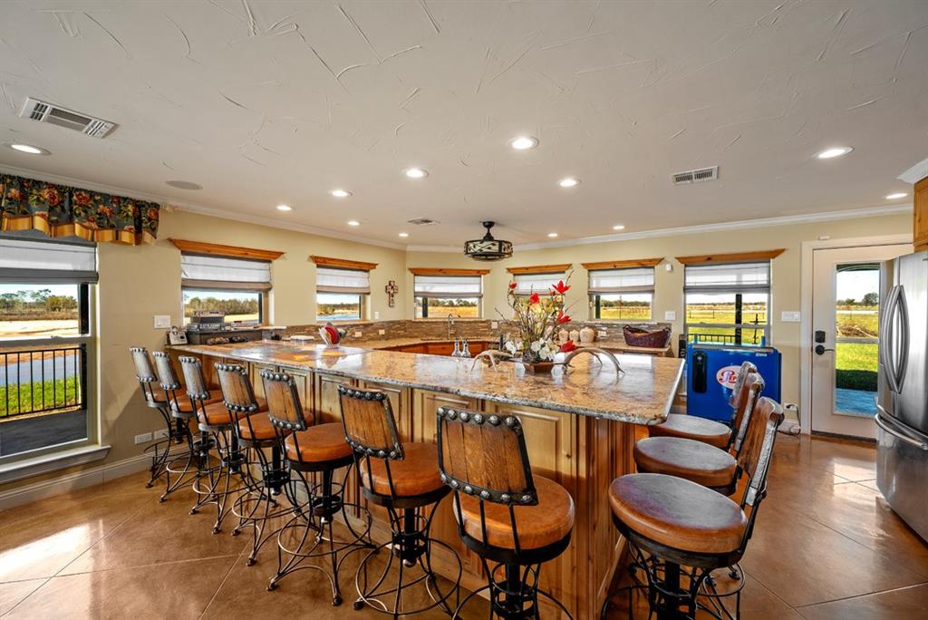 103 Hyde Lake Road Bennington, OK 74723 - Photo 18 of 39 Bar dividing great room