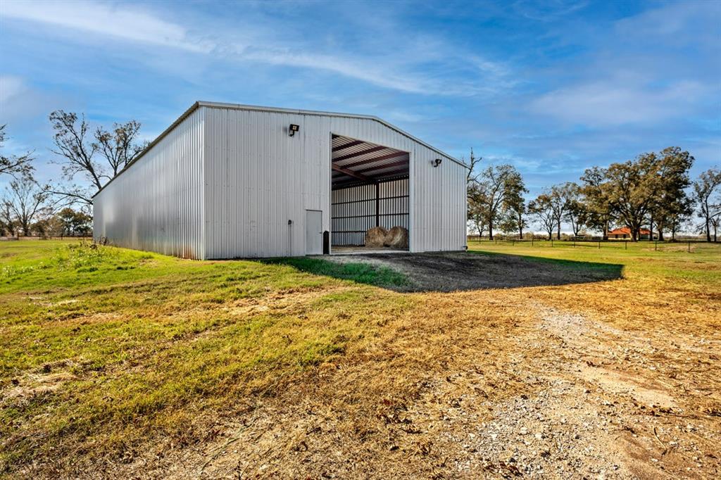 103 Hyde Lake Road Bennington, OK 74723 - Photo 4 of 39 Hay barn with concrete floor