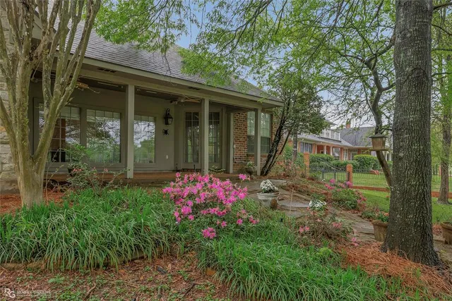 a backyard of a house with lots of green space