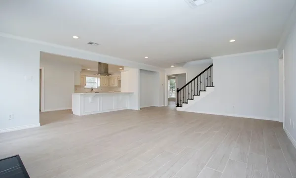 a view of a kitchen with a sink and a window