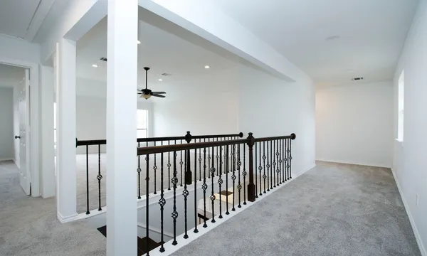 a view of hallway with stairs