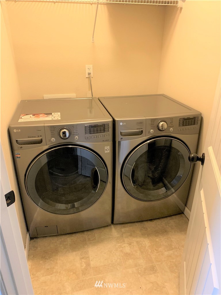 273 Graham Avenue Northeast Renton, WA 98059 - Photo 22 of 23 a utility room with dryer and washer