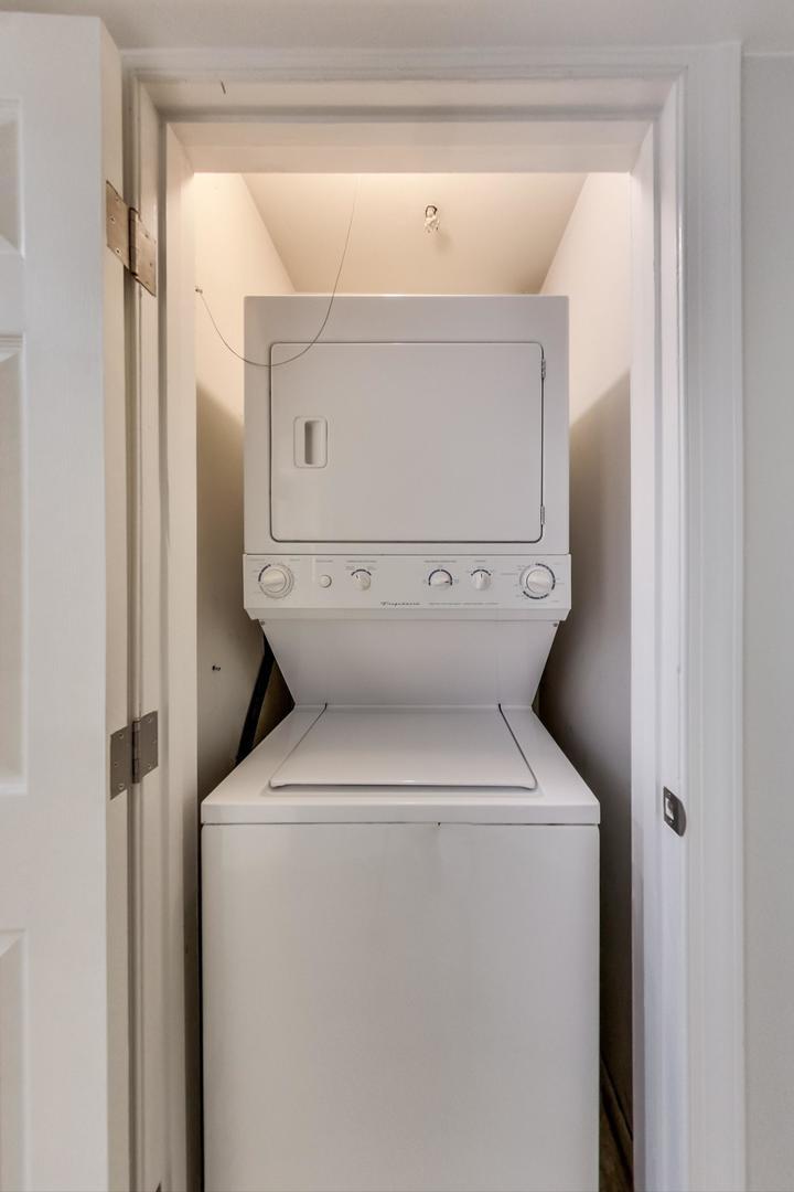 1422 West Lexington Street, Unit 2F Chicago, IL 60607 - Photo 15 of 19 a view of bathroom with a washer and dryer