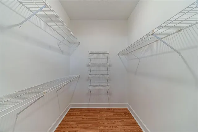 a view of a hallway with staircase