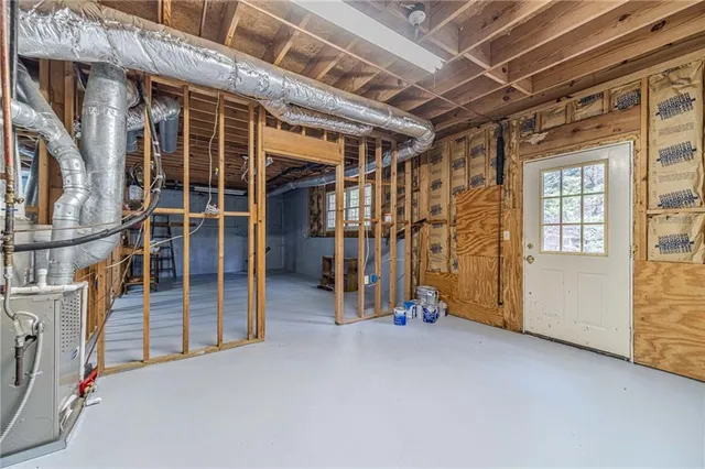 a view of balcony with wooden floor and fence