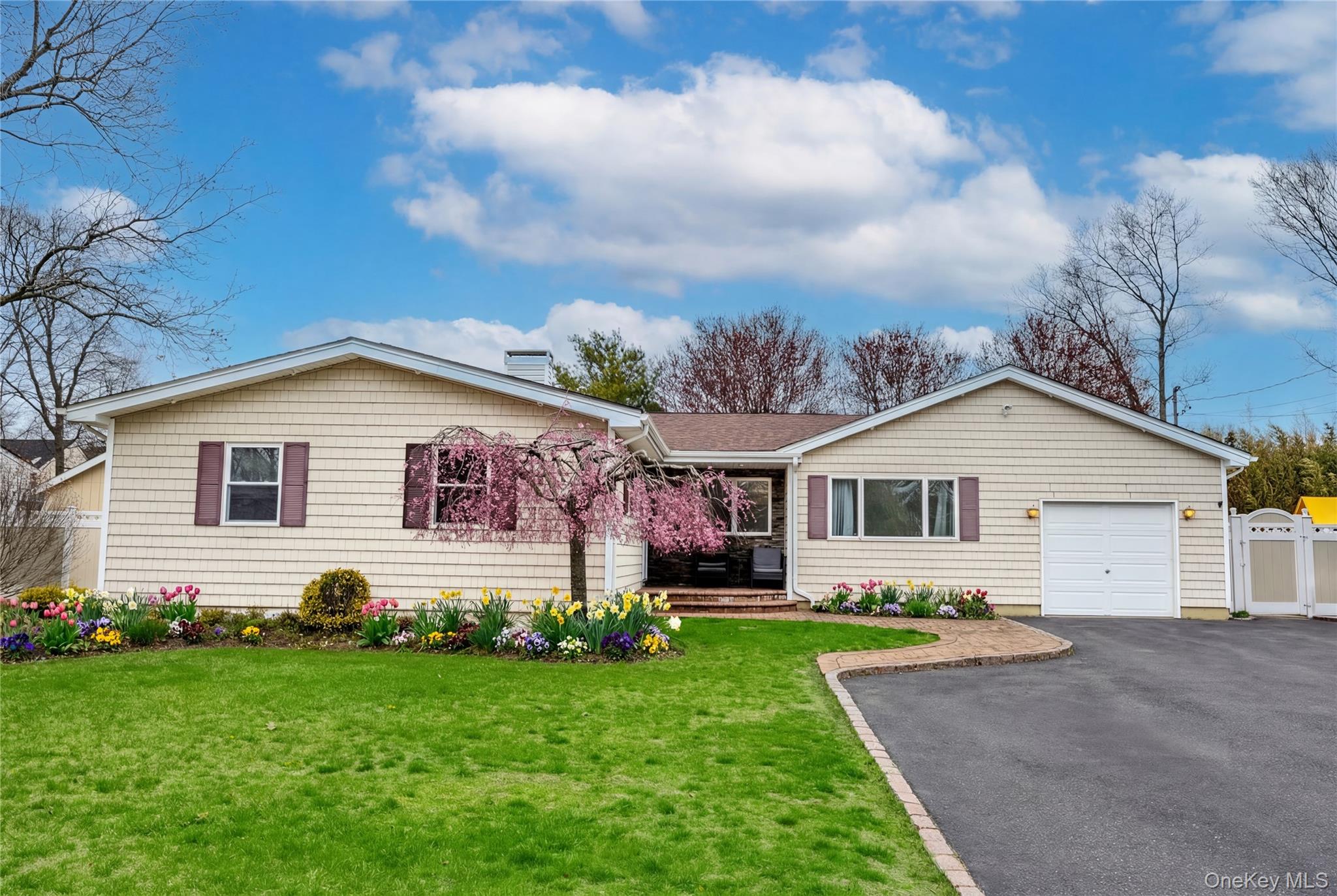 31 Halliday Road Coram, NY 11727 - Photo 1 of 30 a front view of house with yard and green space