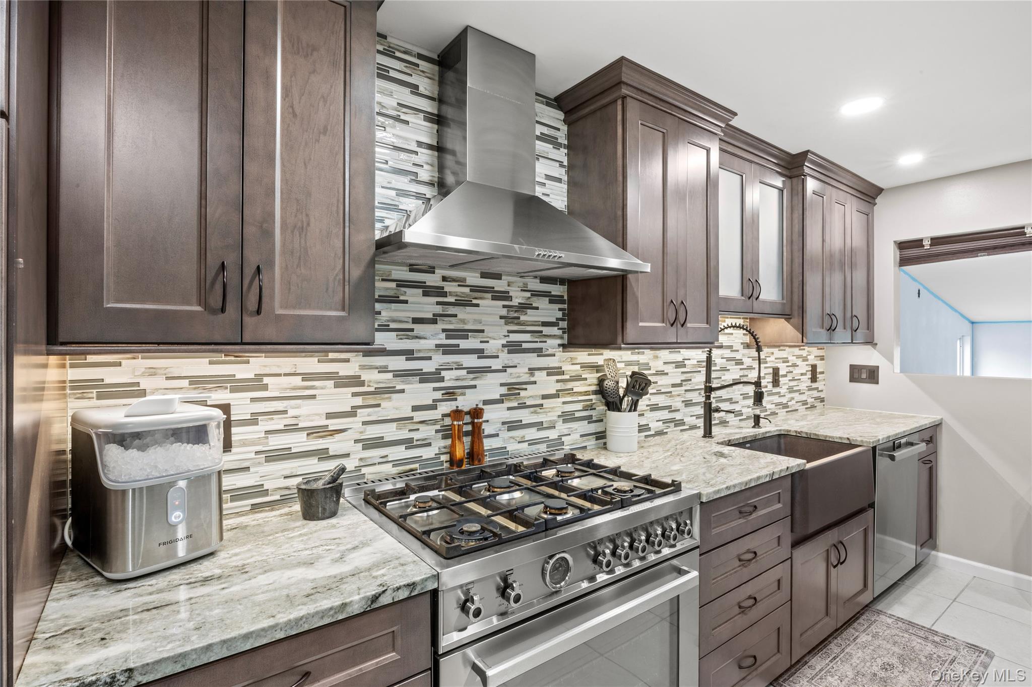 31 Halliday Road Coram, NY 11727 - Photo 2 of 30 a kitchen with a sink stove and cabinets