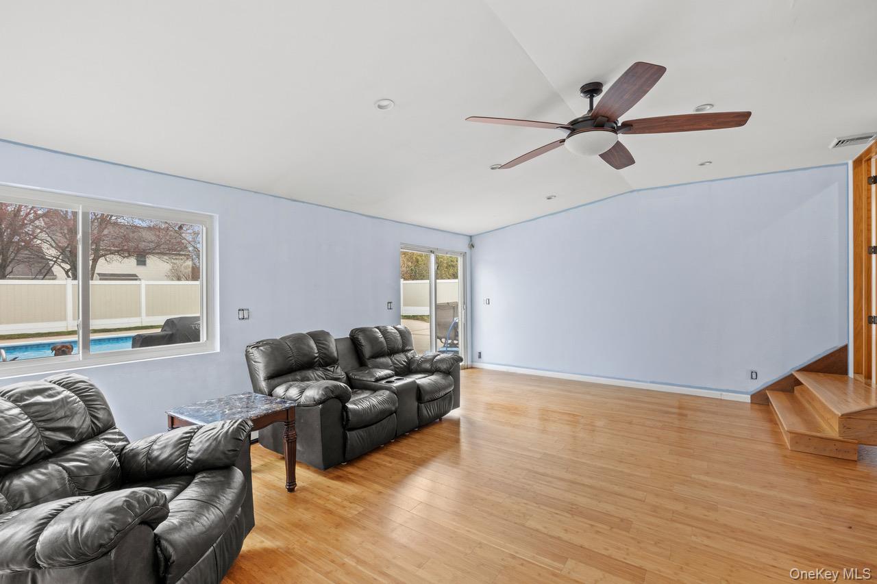31 Halliday Road Coram, NY 11727 - Photo 21 of 30 a living room with furniture and a window