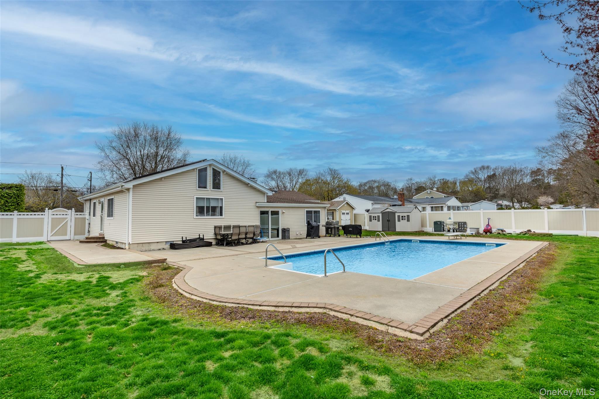 31 Halliday Road Coram, NY 11727 - Photo 25 of 30 an aerial view of a house with swimming pool garden and patio