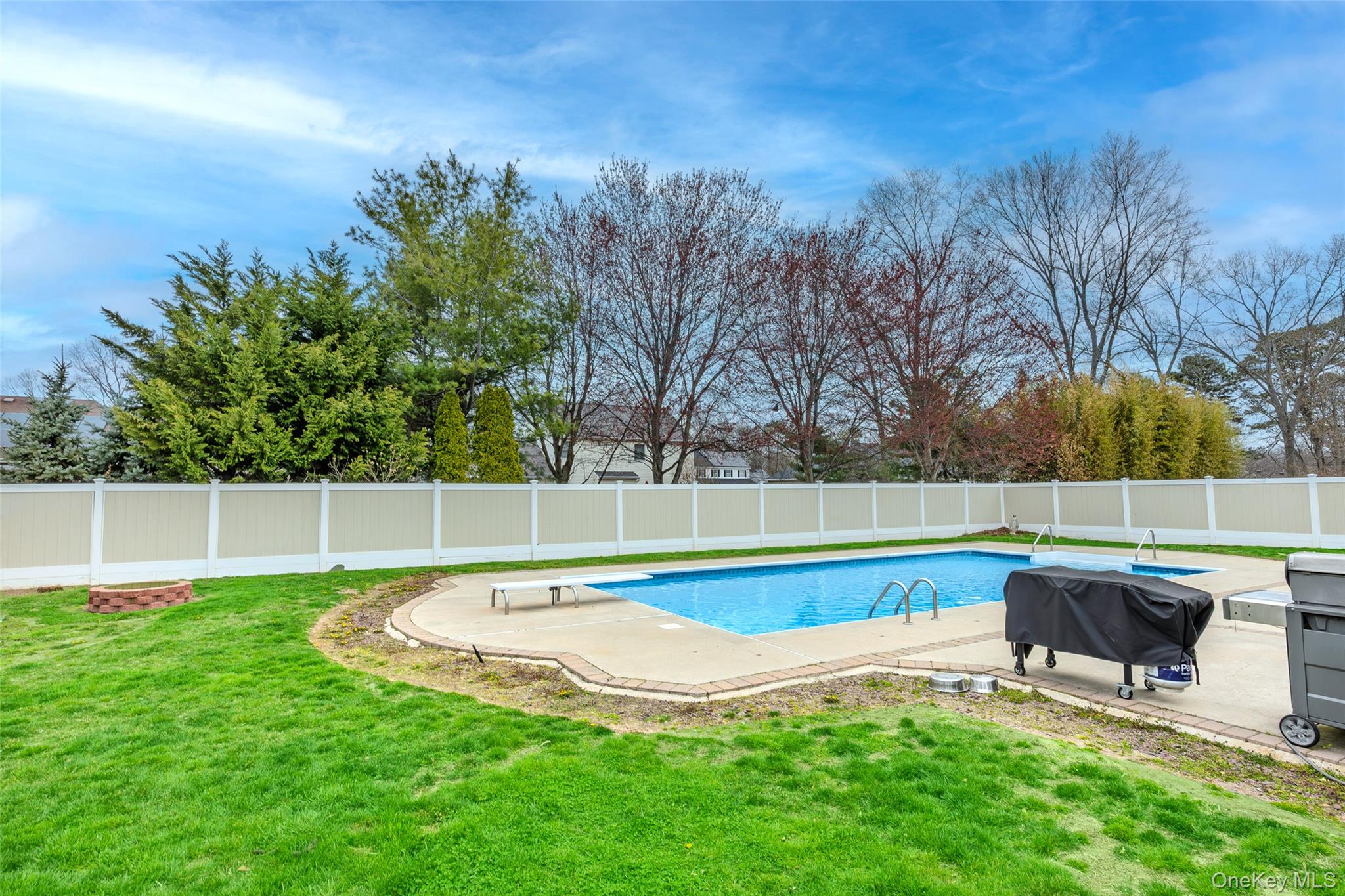 31 Halliday Road Coram, NY 11727 - Photo 26 of 30 a view of a swimming pool with a patio and a yard