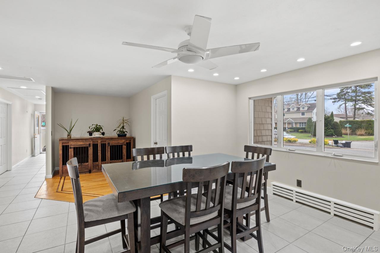 31 Halliday Road Coram, NY 11727 - Photo 9 of 30 a view of a dining room with furniture and window