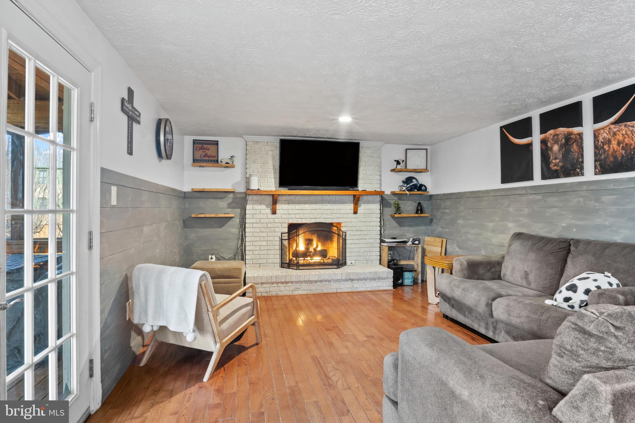 15500 Laurel Ridge Road Dumfries, VA 22025 - Photo 17 of 40 Cozy living space with a warm fireplace.