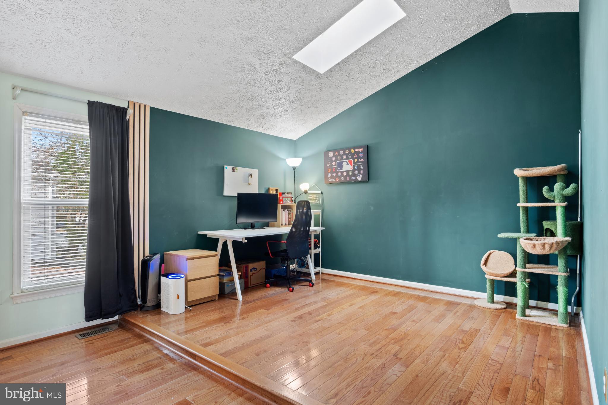 15500 Laurel Ridge Road Dumfries, VA 22025 - Photo 23 of 40 Bright, inviting workspace with vibrant walls.