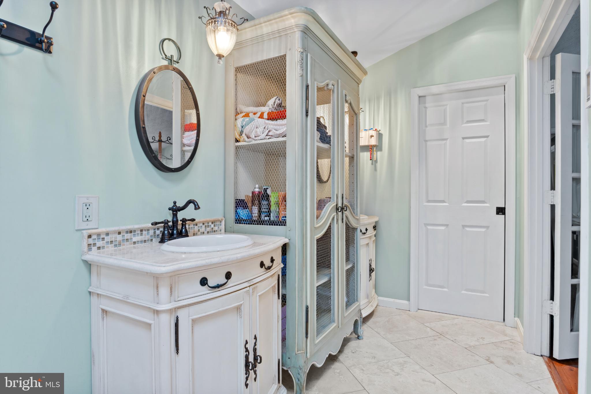 15500 Laurel Ridge Road Dumfries, VA 22025 - Photo 25 of 40 Charming bathroom with vintage elegance.