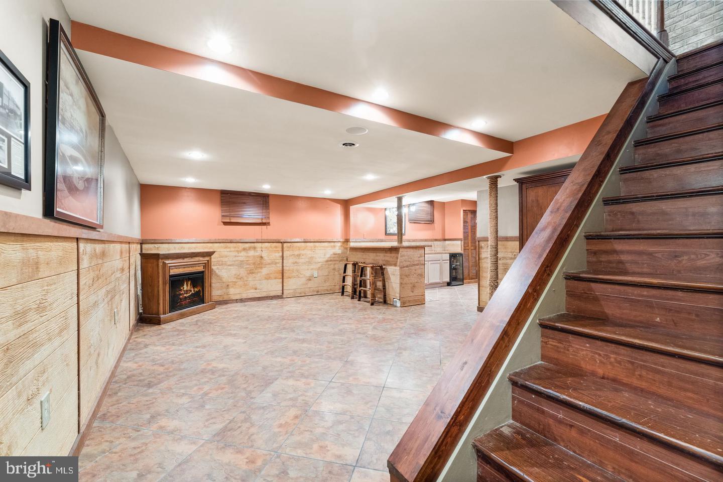 15500 Laurel Ridge Road Dumfries, VA 22025 - Photo 33 of 40 Inviting basement retreat with warm tones.