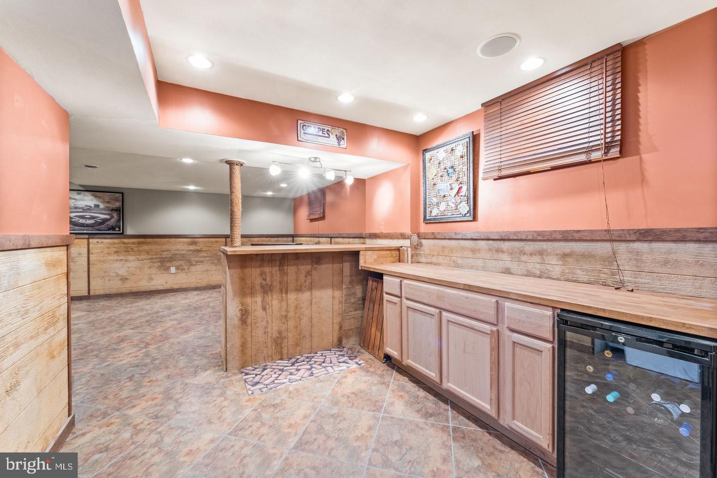 15500 Laurel Ridge Road Dumfries, VA 22025 - Photo 35 of 40 Inviting basement retreat with rustic charm.