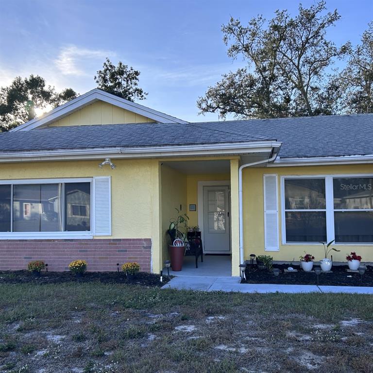 1495 Bishop Road Spring Hill, FL 34608 - Photo 2 of 34 a front view of a house