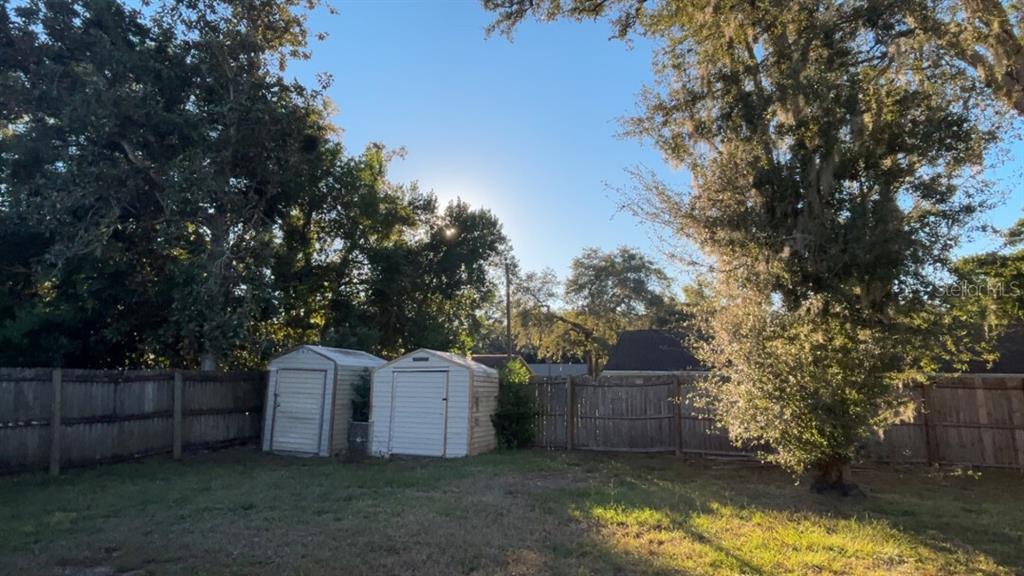 1495 Bishop Road Spring Hill, FL 34608 - Photo 33 of 34 a view of a backyard