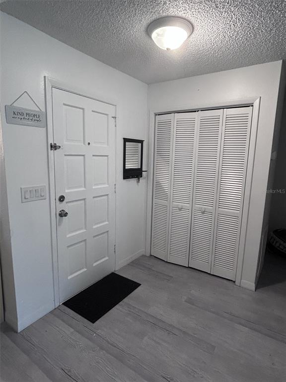 1495 Bishop Road Spring Hill, FL 34608 - Photo 5 of 34 wooden floor in an empty room
