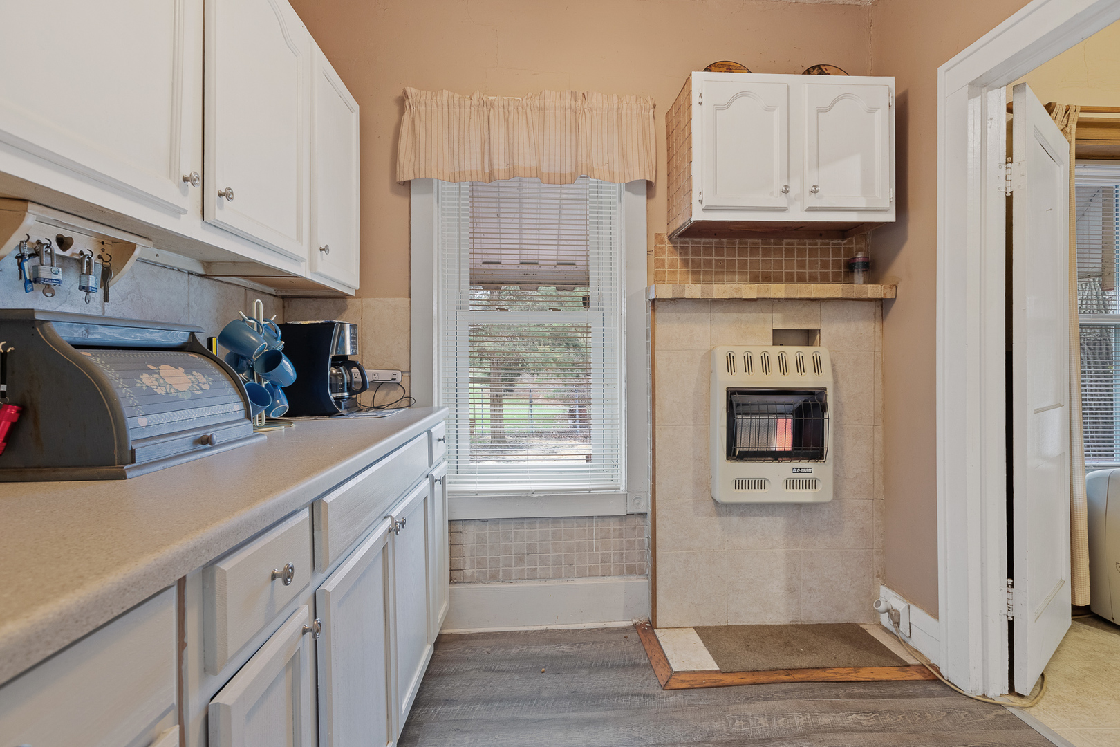 5714 East 3500S Road St. Anne, IL 60964 - Photo 14 of 35 a kitchen with stainless steel appliances granite countertop a refrigerator and a stove