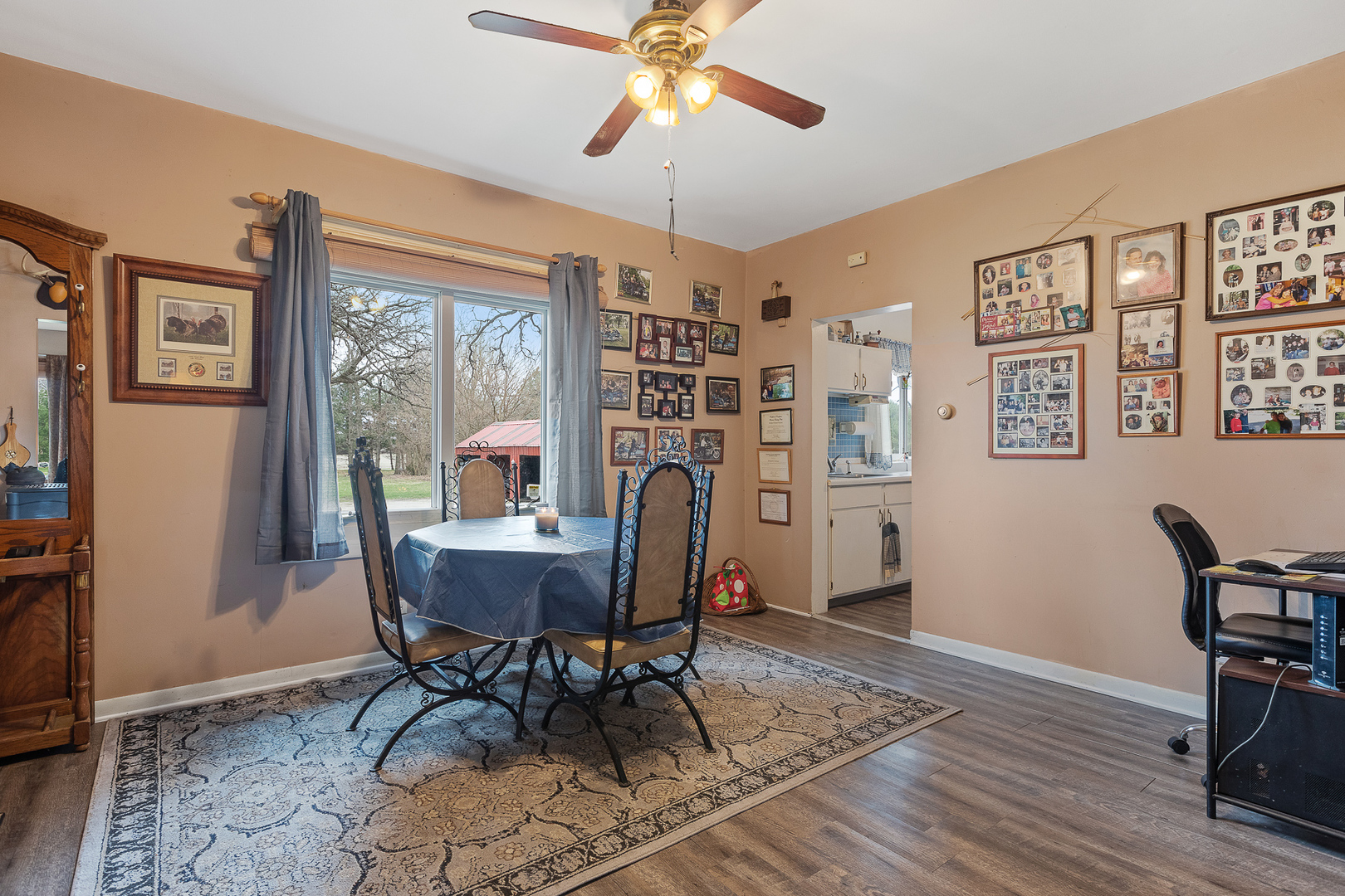 5714 East 3500S Road St. Anne, IL 60964 - Photo 17 of 35 a workspace with furniture window and wooden floor