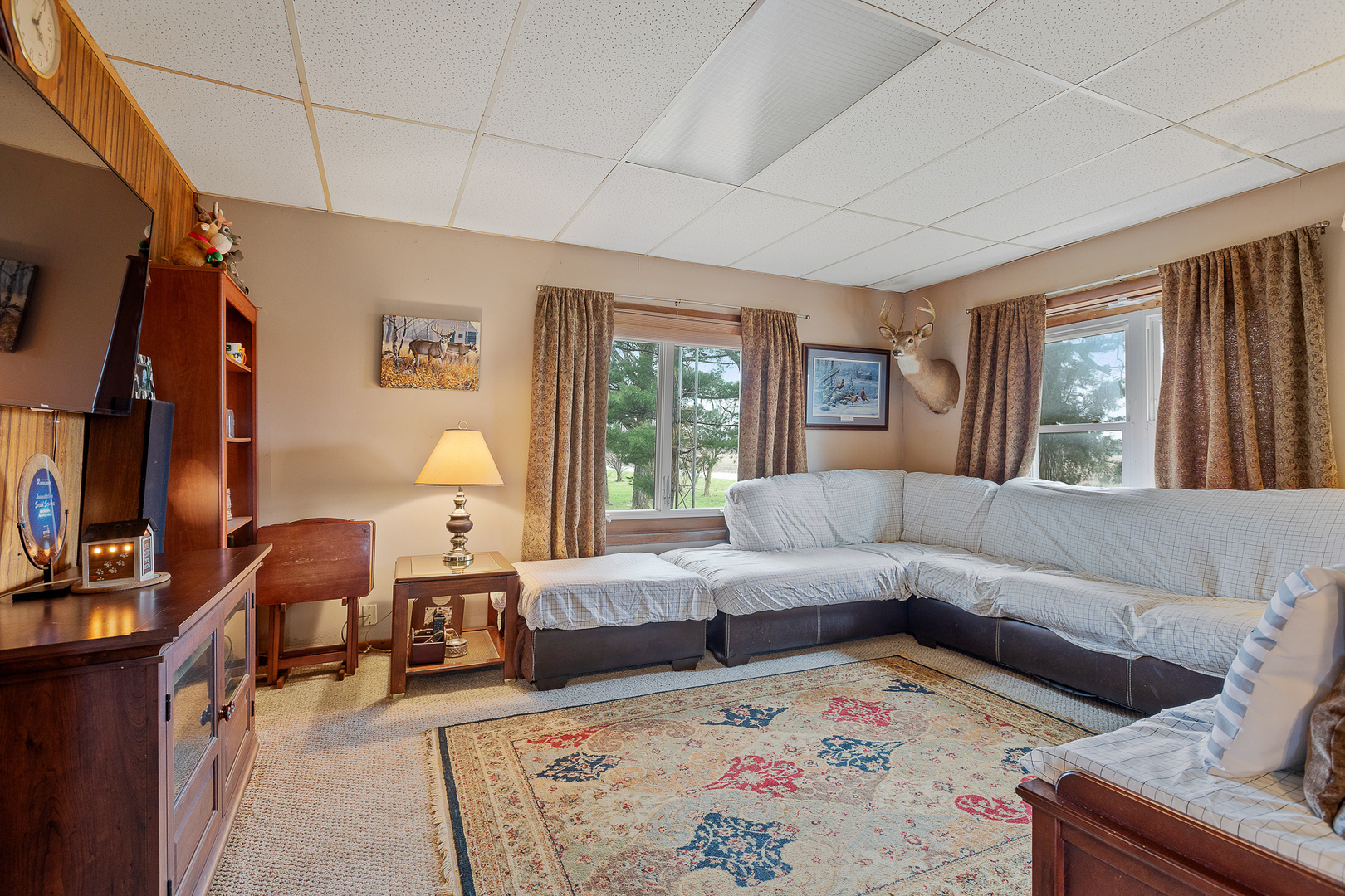5714 East 3500S Road St. Anne, IL 60964 - Photo 18 of 35 a living room with furniture and a couch
