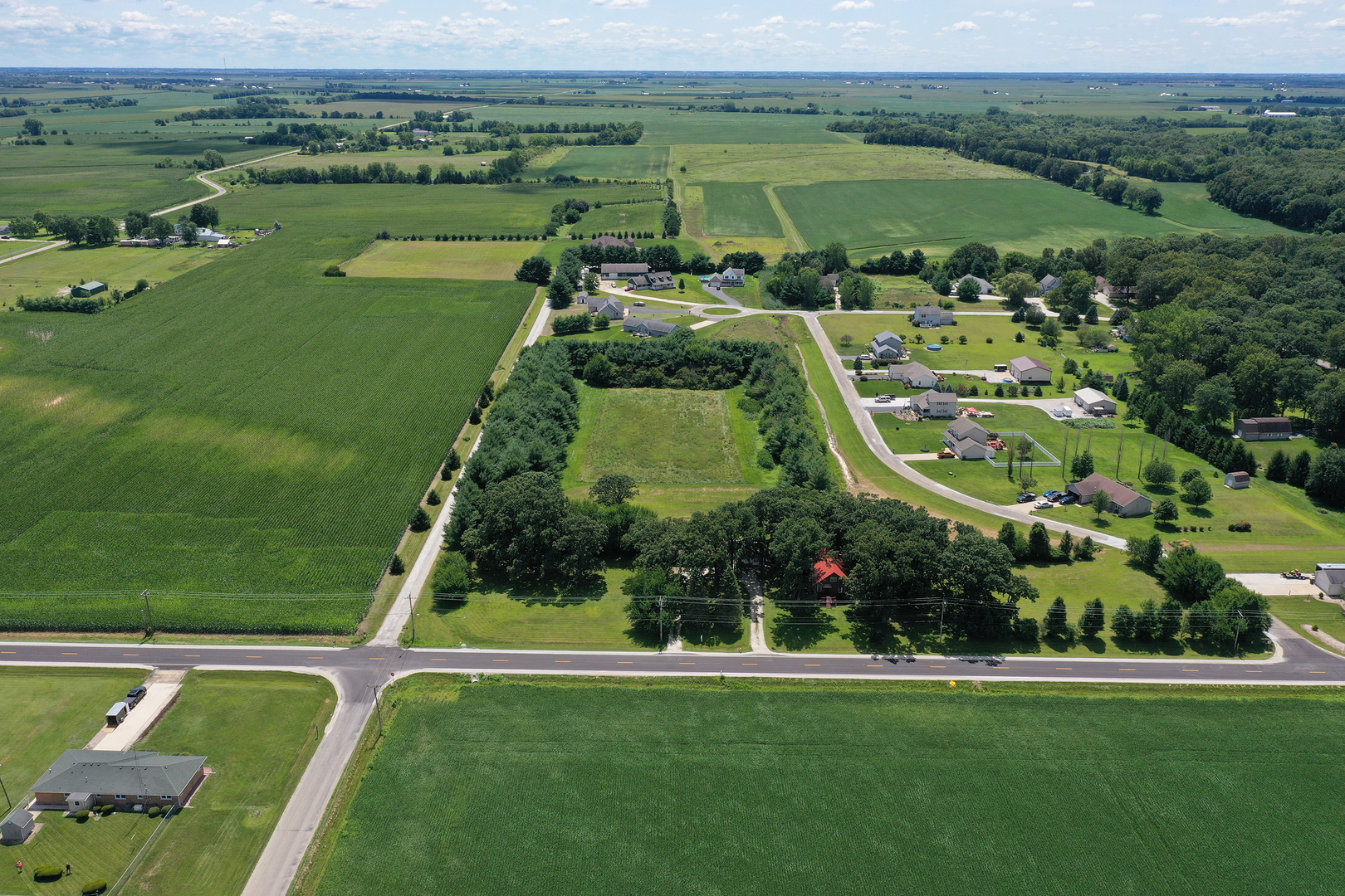 5714 East 3500S Road St. Anne, IL 60964 - Photo 30 of 35 an aerial view of a golf course with a garden