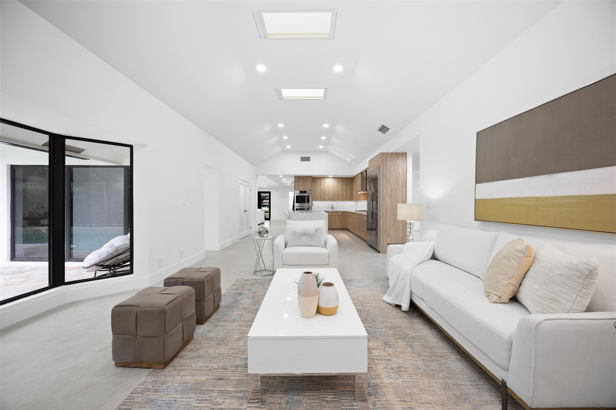 7571 Estrella Circle Boca Raton, FL 33433 - Photo 28 of 79 a living room with furniture and a large window