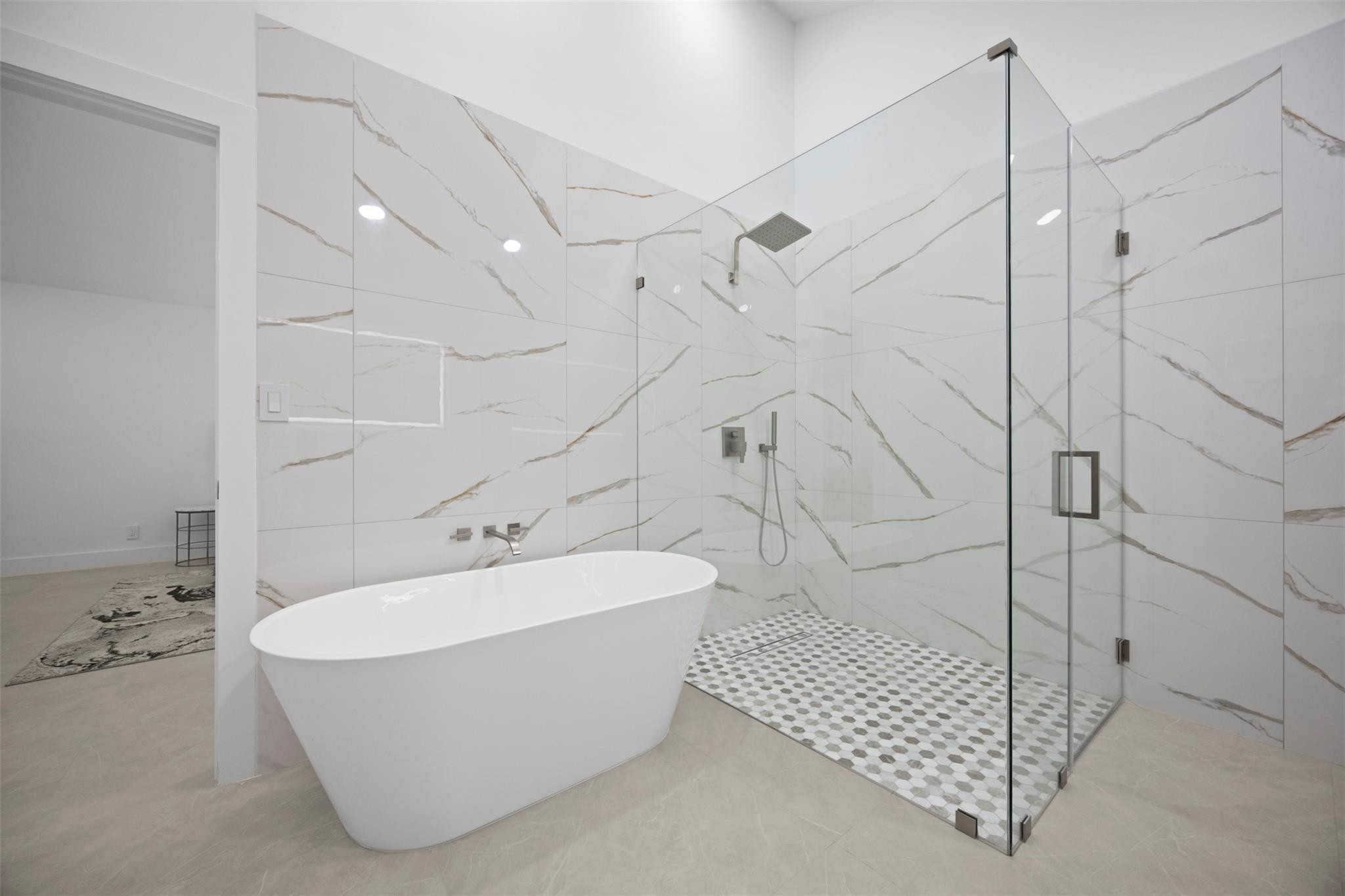 7571 Estrella Circle Boca Raton, FL 33433 - Photo 41 of 79 a white bath tub sitting next to a white sink and vanity