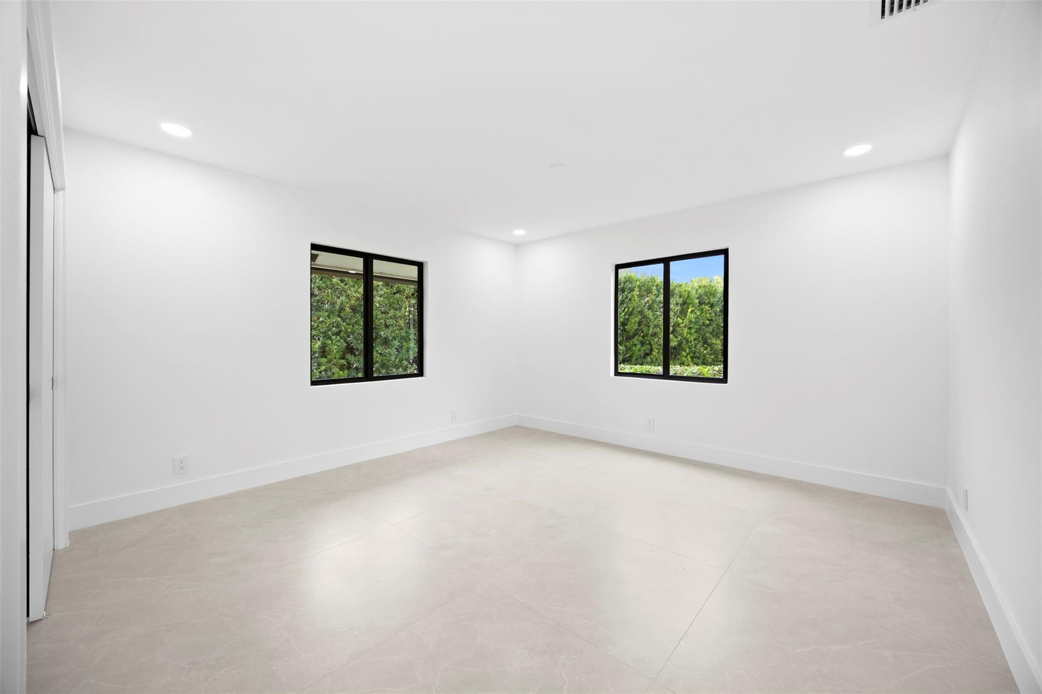 7571 Estrella Circle Boca Raton, FL 33433 - Photo 45 of 79 an empty room with windows