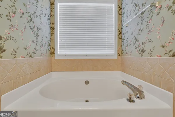 a bathroom with a bathtub
