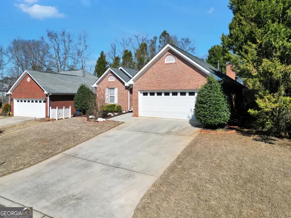 front view of a house with a yard