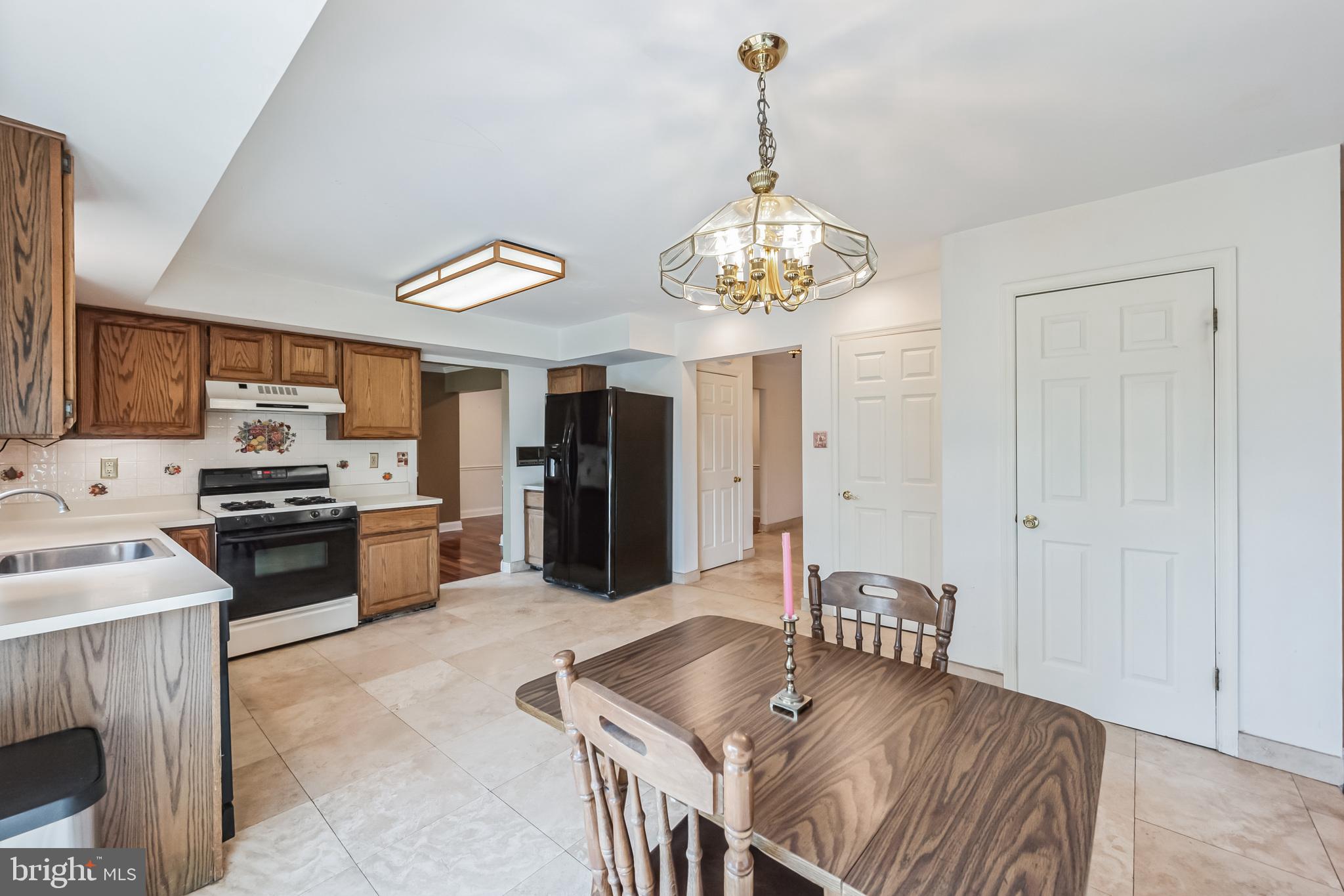 2179 Buchert Road Pottstown, PA 19464 - Photo 10 of 31 Eat-in kitchen leads to the deck + huge backyard!