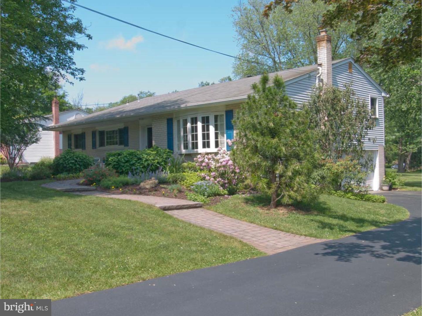275 Old State Road Berwyn, PA 19312 - Photo 1 of 21 a front view of house with yard and green space