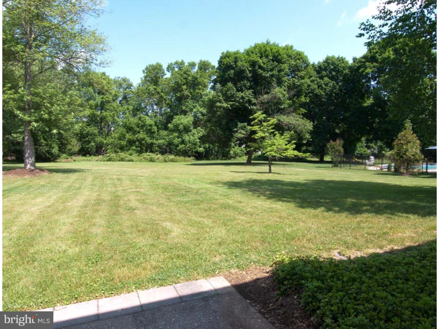 275 Old State Road Berwyn, PA 19312 - Photo 19 of 21 a view of a golf course with a trees