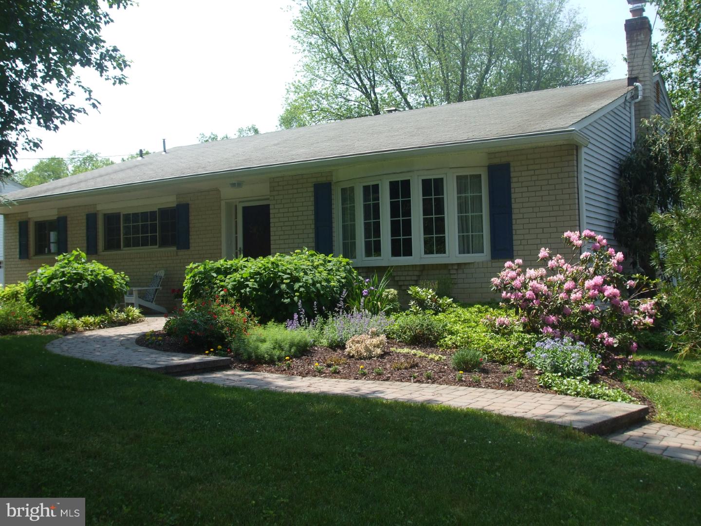 275 Old State Road Berwyn, PA 19312 - Photo 3 of 21 a view of a house with a garden
