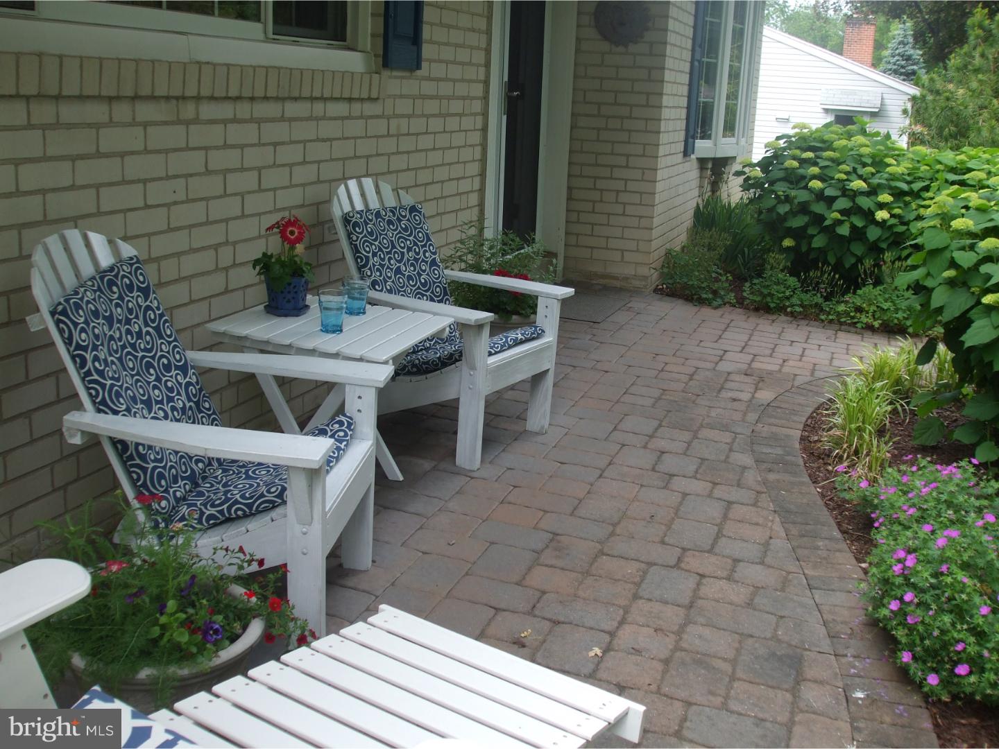 275 Old State Road Berwyn, PA 19312 - Photo 21 of 21 a view of a patio with table and chairs potted plants