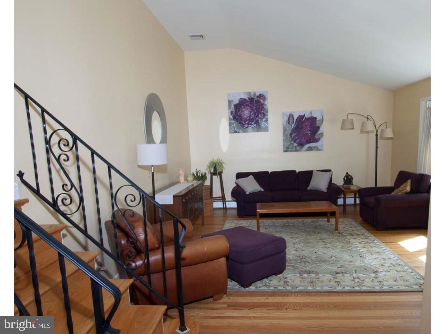 275 Old State Road Berwyn, PA 19312 - Photo 5 of 21 a living room with furniture and a rug