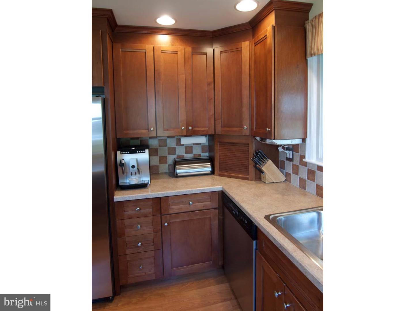 275 Old State Road Berwyn, PA 19312 - Photo 9 of 21 a kitchen with a sink and cabinets