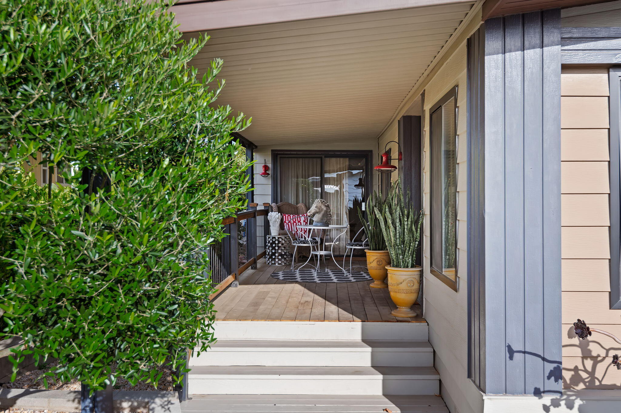 340 Old Mill Road, Unit 26 Santa Barbara, CA 93110 - Photo 3 of 31 a view of a patio with table and chairs and potted plants