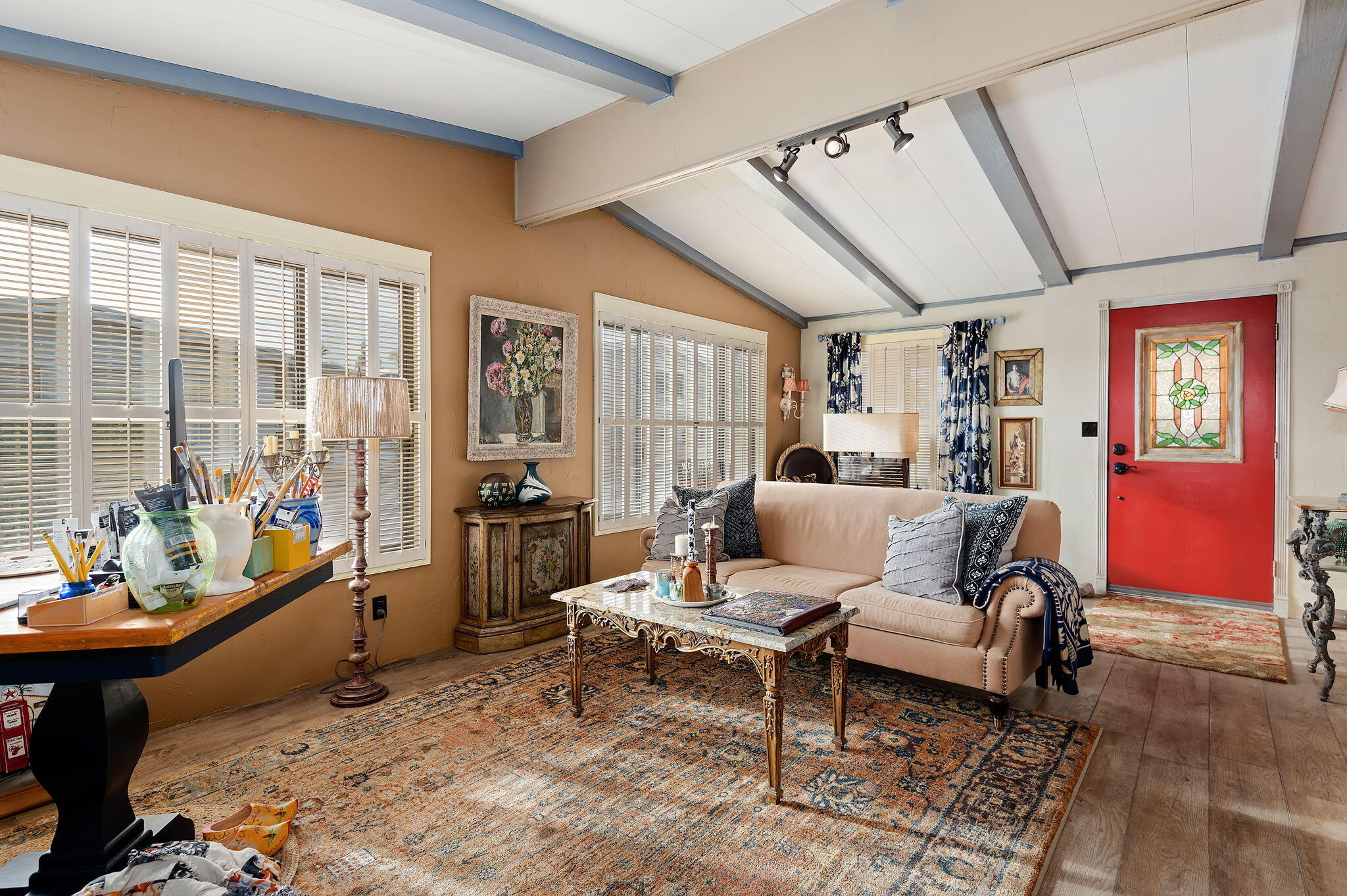 340 Old Mill Road, Unit 26 Santa Barbara, CA 93110 - Photo 6 of 31 a living room with furniture a rug and a large window